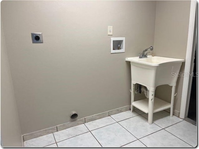 laundry room with washer hookup, light tile patterned floors, and electric dryer hookup