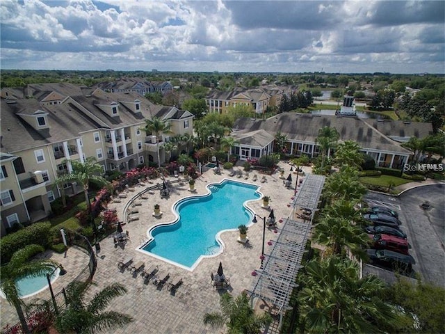 view of swimming pool featuring a patio area