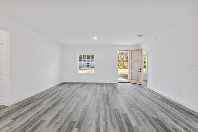 unfurnished room featuring light wood-type flooring