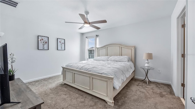 bedroom with light colored carpet and ceiling fan