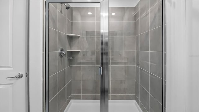 bathroom featuring an enclosed shower