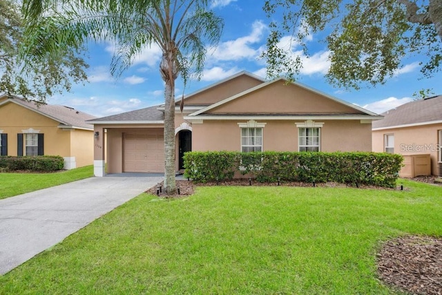 single story home featuring a garage and a front lawn