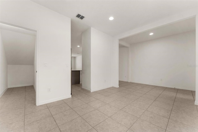 spare room with light tile patterned floors