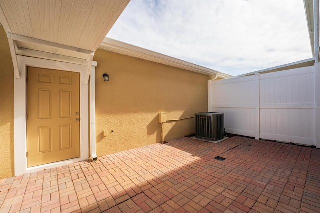 view of patio with central AC