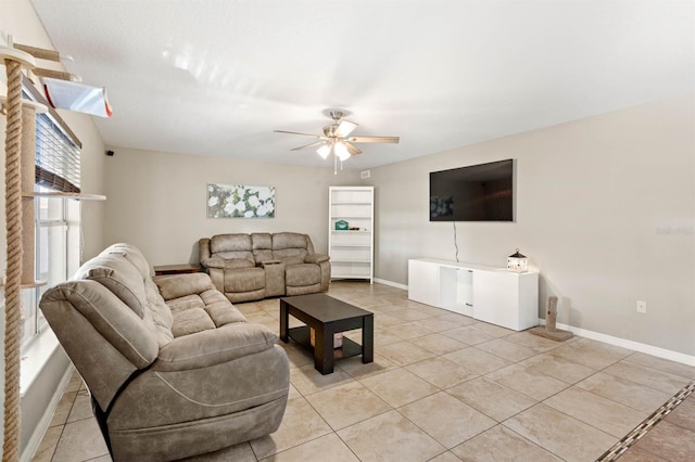 living room featuring ceiling fan and light tile patterned floors