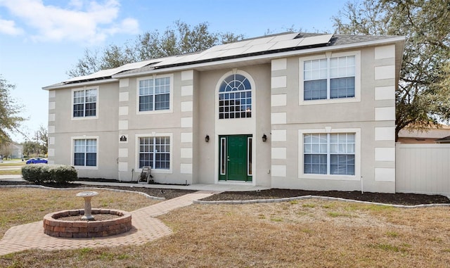 view of front of home with a front lawn