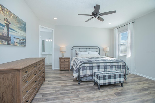 bedroom featuring hardwood / wood-style floors and ceiling fan