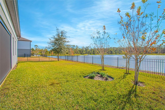 view of yard with a water view