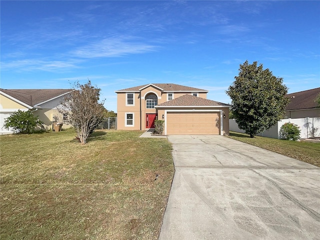 view of front of home featuring a front lawn and a garage