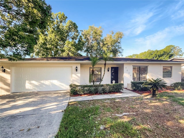 single story home featuring a garage