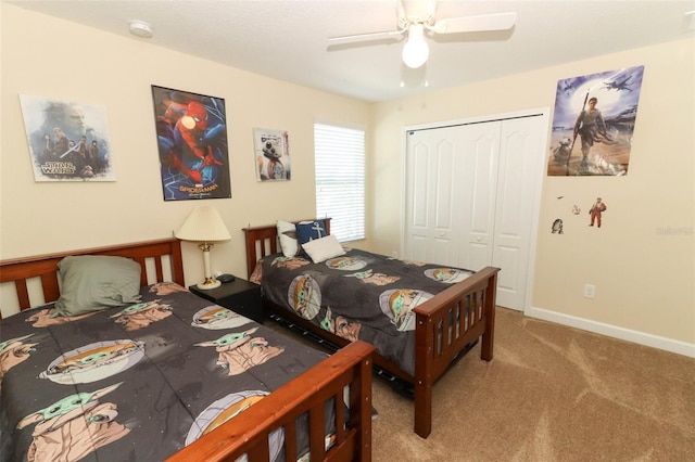 bedroom with carpet flooring, ceiling fan, and a closet