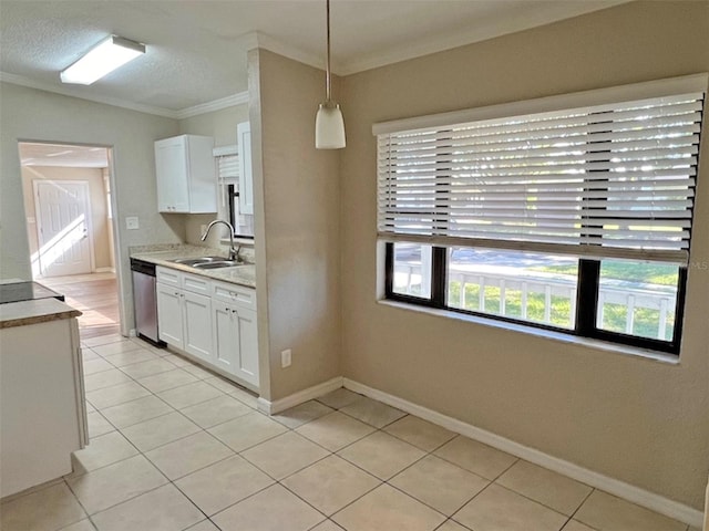 kitchen with white cabinets, crown molding, sink, hanging light fixtures, and stainless steel dishwasher