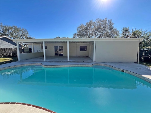 view of pool featuring a patio