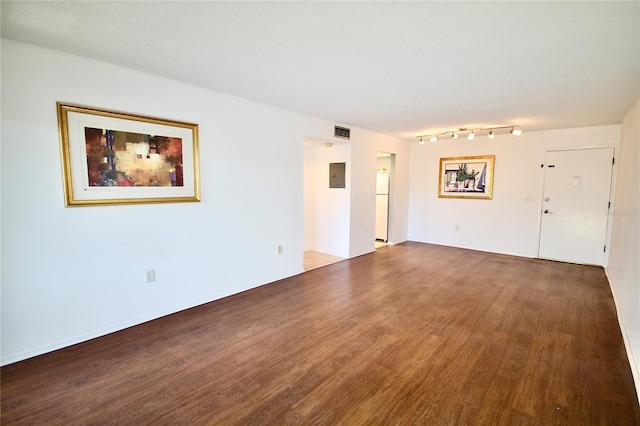 unfurnished room featuring wood-type flooring