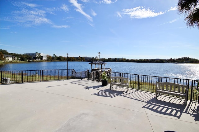 view of patio / terrace with a water view