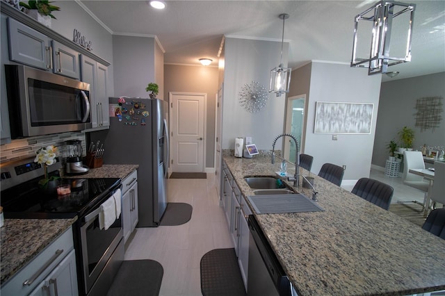 881 Orchid Grove Blvd, Davenport, FL 33837 - kitchen featuring appliances with stainless steel finishes, a peninsula, stone counters, ornamental molding, and recessed lighting