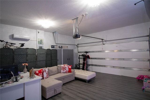 881 Orchid Grove Blvd, Davenport, FL 33837 - garage featuring a garage door opener, concrete block wall, and a wall unit AC