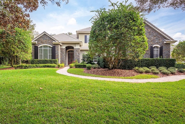 view of front of home featuring a front lawn