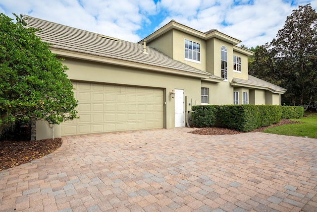 view of property featuring a garage