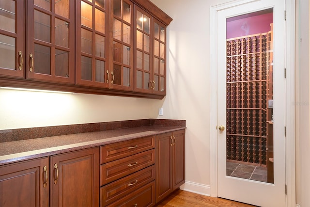 wine cellar featuring light hardwood / wood-style floors