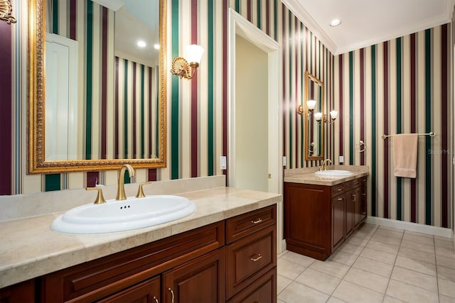 bathroom with tile patterned floors, crown molding, and vanity