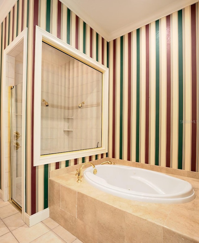 bathroom featuring tile patterned flooring and separate shower and tub