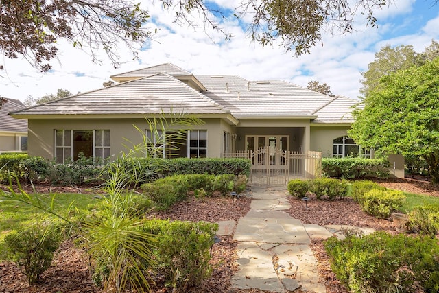 rear view of house with french doors