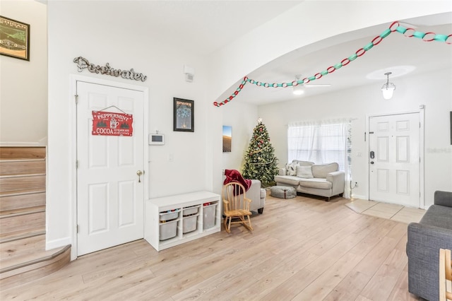 entryway with light hardwood / wood-style floors