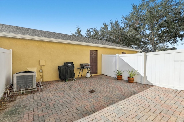 view of patio / terrace featuring grilling area and cooling unit