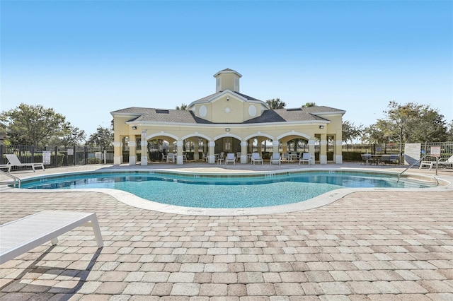 view of swimming pool featuring a patio area