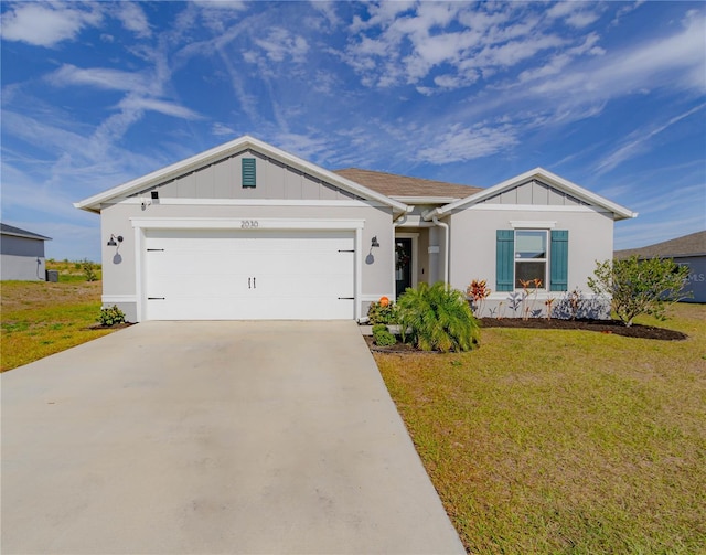 single story home with a front yard and a garage