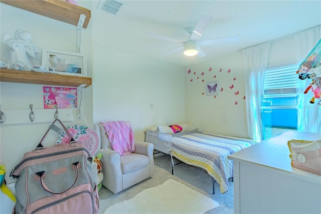 carpeted bedroom featuring ceiling fan