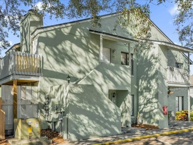 view of property exterior with a balcony