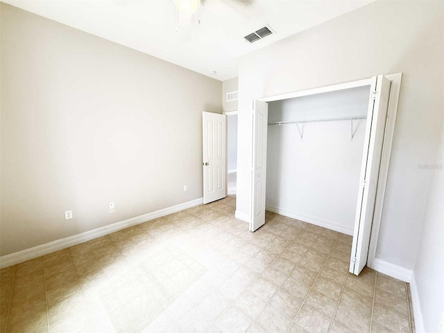 1208 Sawgrass Pointe Dr, Orlando, FL 32824 - unfurnished bedroom with baseboards, ceiling fan, a closet, and visible vents