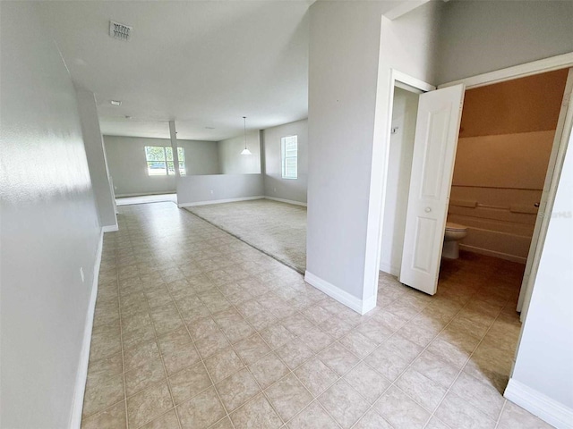 1208 Sawgrass Pointe Dr, Orlando, FL 32824 - empty room featuring visible vents and baseboards