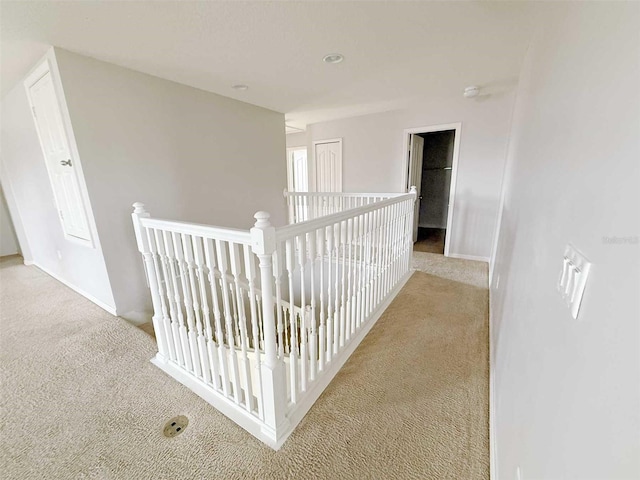 1208 Sawgrass Pointe Dr, Orlando, FL 32824 - corridor with carpet flooring, baseboards, and an upstairs landing