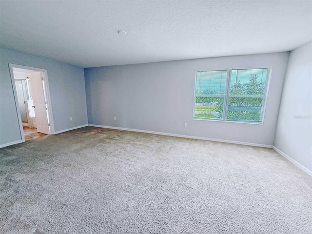 1208 Sawgrass Pointe Dr, Orlando, FL 32824 - spare room with carpet flooring and baseboards