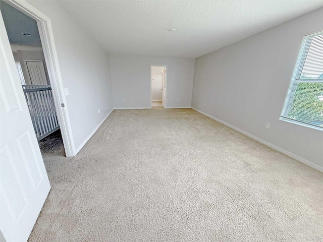 1208 Sawgrass Pointe Dr, Orlando, FL 32824 - unfurnished room with light carpet and baseboards