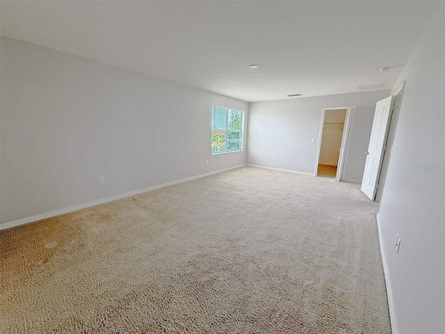 1208 Sawgrass Pointe Dr, Orlando, FL 32824 - unfurnished room with baseboards, visible vents, and carpet floors