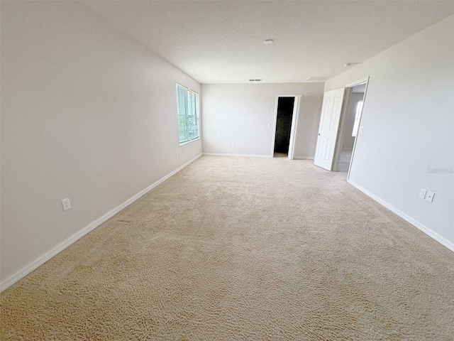 1208 Sawgrass Pointe Dr, Orlando, FL 32824 - carpeted empty room with baseboards