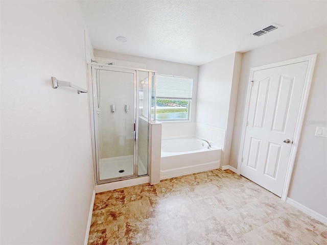 1208 Sawgrass Pointe Dr, Orlando, FL 32824 - bathroom featuring a shower stall, baseboards, a bath, and visible vents