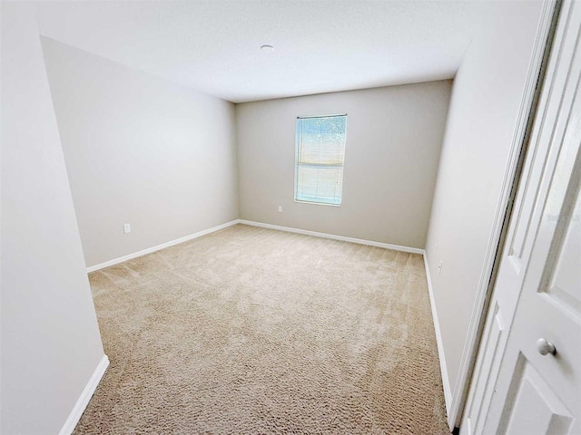 1208 Sawgrass Pointe Dr, Orlando, FL 32824 - spare room featuring carpet and baseboards