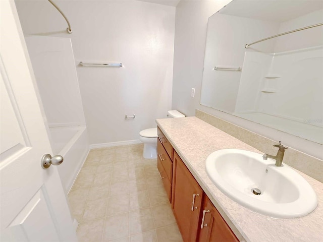 1208 Sawgrass Pointe Dr, Orlando, FL 32824 - full bathroom featuring toilet, baseboards, tile patterned floors, vanity, and washtub / shower combination