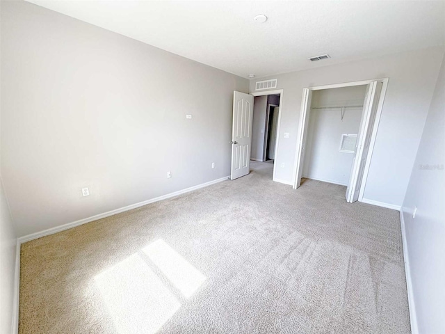 1208 Sawgrass Pointe Dr, Orlando, FL 32824 - unfurnished bedroom featuring carpet floors, baseboards, visible vents, and a closet
