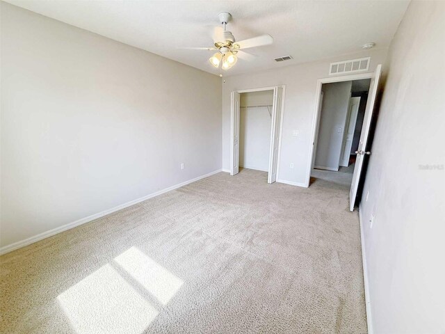 1208 Sawgrass Pointe Dr, Orlando, FL 32824 - unfurnished bedroom featuring baseboards, a closet, visible vents, and carpet floors