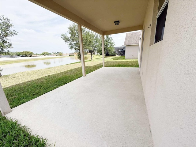 1208 Sawgrass Pointe Dr, Orlando, FL 32824 - view of patio / terrace featuring a water view