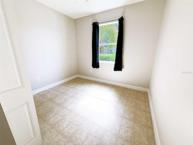 1208 Sawgrass Pointe Dr, Orlando, FL 32824 - spare room with baseboards