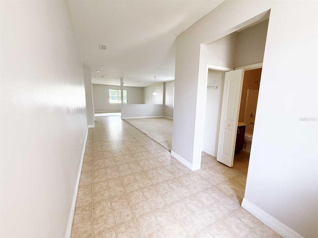 1208 Sawgrass Pointe Dr, Orlando, FL 32824 - corridor featuring visible vents and baseboards