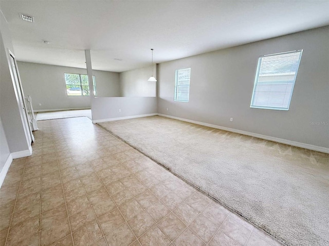 1208 Sawgrass Pointe Dr, Orlando, FL 32824 - carpeted spare room featuring baseboards, tile patterned floors, and visible vents