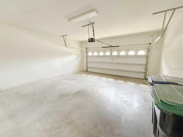 1208 Sawgrass Pointe Dr, Orlando, FL 32824 - garage featuring a garage door opener